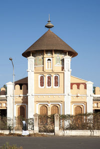 Exterior of historic building against clear blue sky