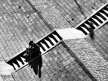 High angle view of couple sitting outdoors