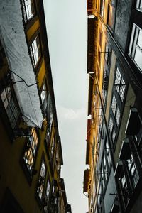 Low angle view of skyscrapers against sky