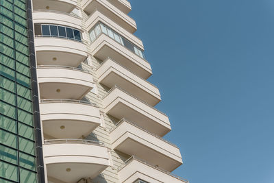 New residential apartment building with large balconies. houses of modern architecture by the sea.