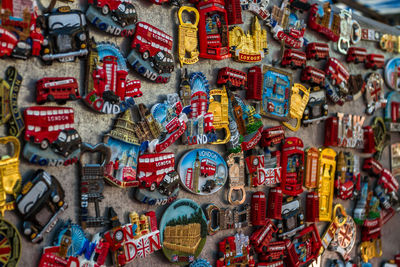 Full frame shot of multi colored souvenir hanging in market for sale