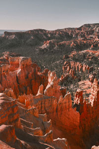 Layers of vibrant orange rock formations in bryce canyon national park