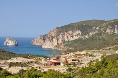 Scenic view of sea against clear blue sky in nebida, sardinia