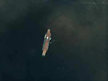 High angle view of boat floating on sea