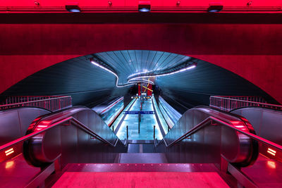 Illuminated escalator in tunnel