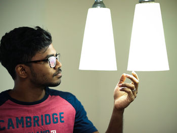 Portrait of young man looking away