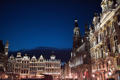 Illuminated cathedral against sky at night