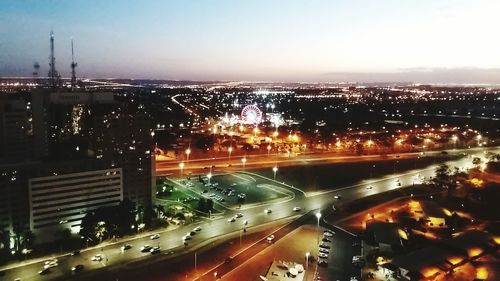 High angle view of light trails on road in city