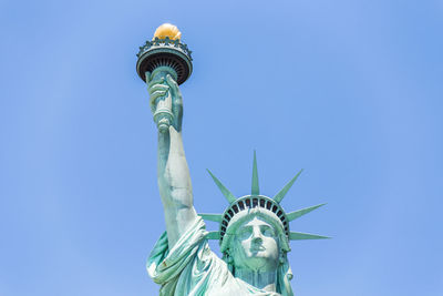 Low angle view of statue against clear sky