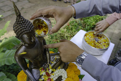 High angle view of man preparing food