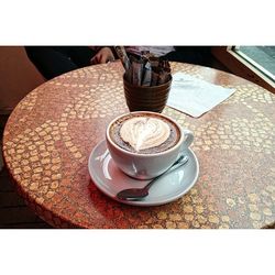 Coffee cup on table