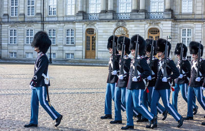Group of people in front of building