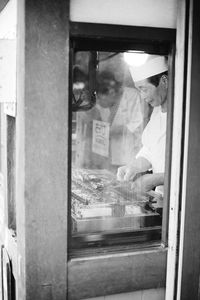 Man working at window