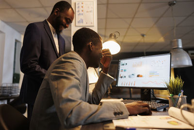 Business colleagues working in office