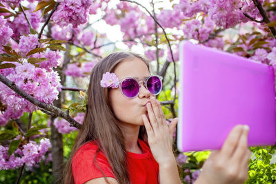 Young woman using mobile phone