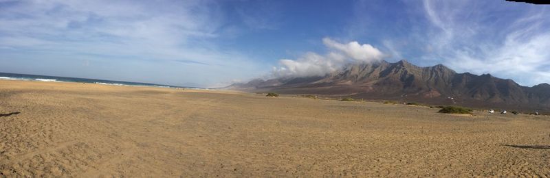 Panoramic view of mountains against sky