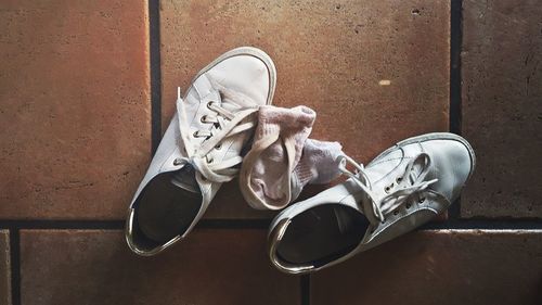 High angle view of shoes and socks on floor