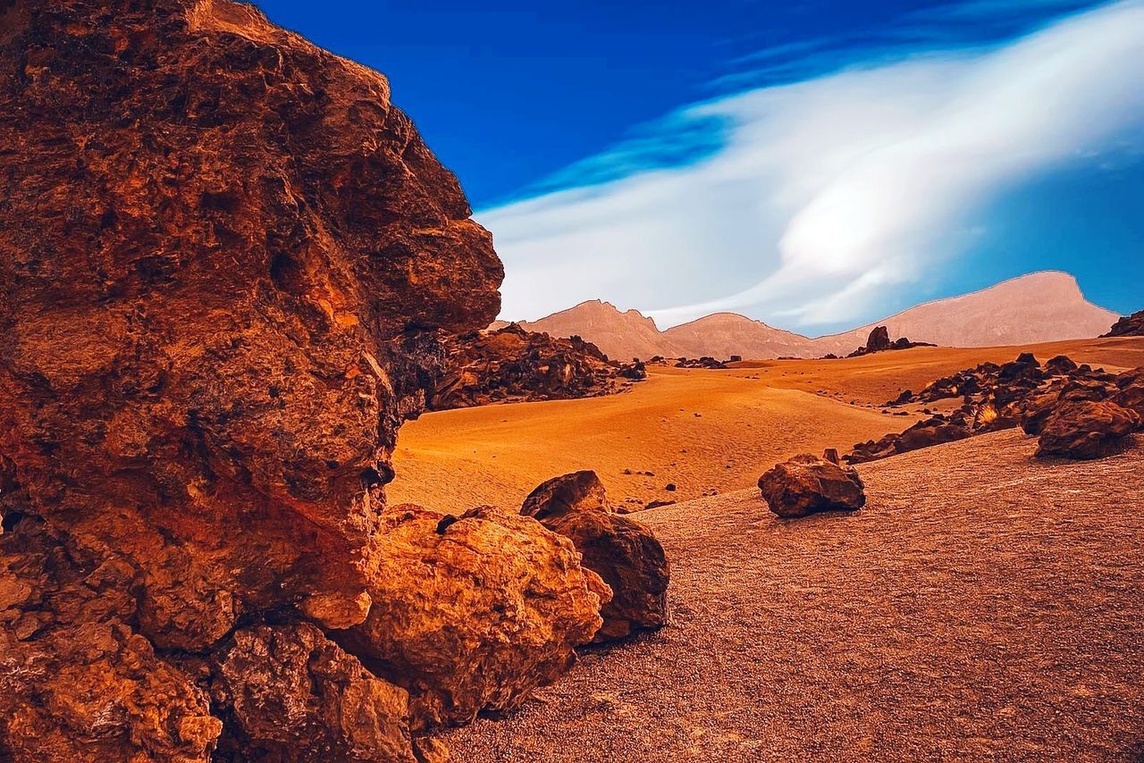 sky, rock, rock - object, scenics - nature, tranquil scene, rock formation, beauty in nature, tranquility, solid, non-urban scene, environment, no people, geology, physical geography, nature, remote, cloud - sky, landscape, idyllic, climate, arid climate, eroded, formation, sandstone