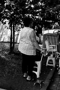 Man standing on chair