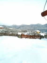 Scenic view of mountains against sky during winter