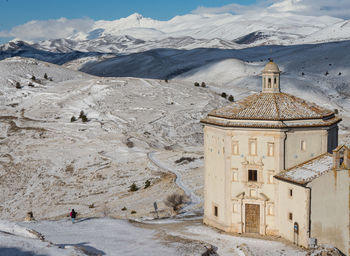 High angle view of building against mountain during winter