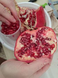 Close-up of hand holding sweet food