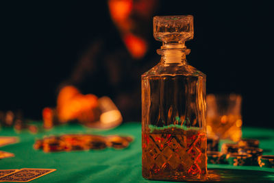 Close-up of glass bottles on table