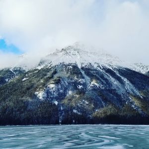 Scenic view of mountains against sky during winter