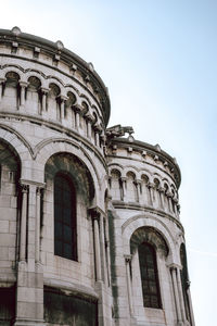 Low angle view of old building against clear sky