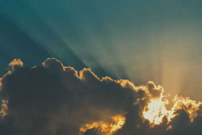 Low angle view of clouds in sky during sunset