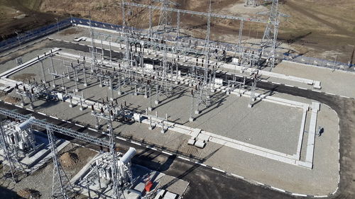 High angle view of machinery on road in city