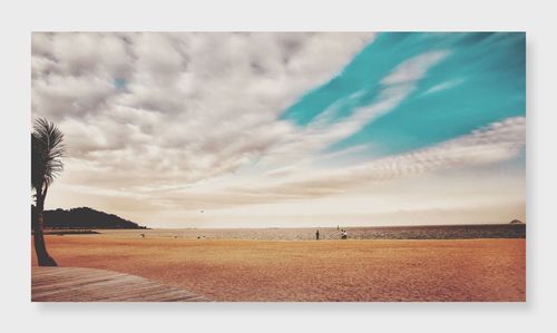 Scenic view of beach against sky