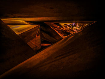 High angle view of illuminated bridge against sky at night
