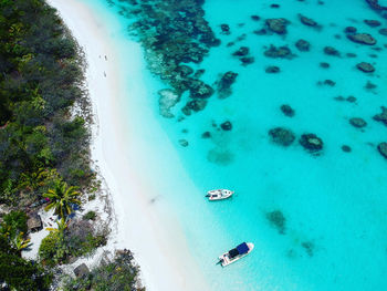 High angle view of boats on sea shore