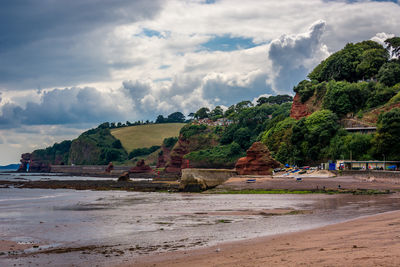 Scenic view of beach against sky