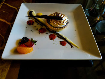High angle view of dessert served on table