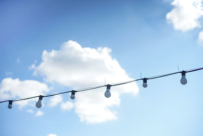 Low angle view of street light against sky