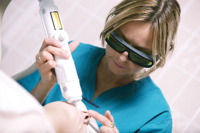 Doctor treating patient at hospital