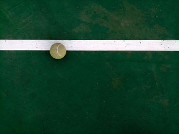 High angle view of tennis ball at paddle tennis court 