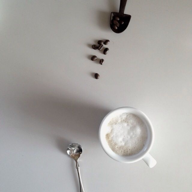 indoors, food and drink, table, coffee cup, drink, still life, spoon, refreshment, cup, coffee - drink, coffee, saucer, close-up, high angle view, white background, no people, directly above, copy space, freshness, plate