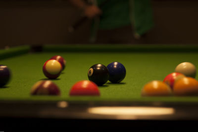 Close-up of multi colored balls on table