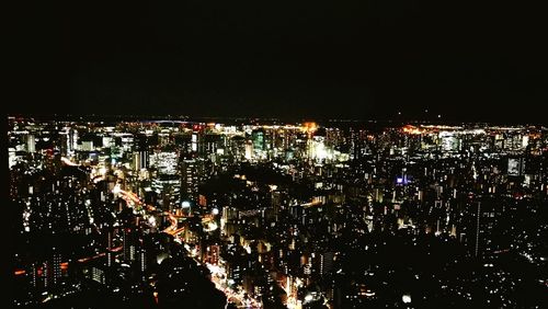 Illuminated cityscape at night