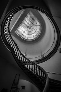 Low angle view of spiral staircase in building