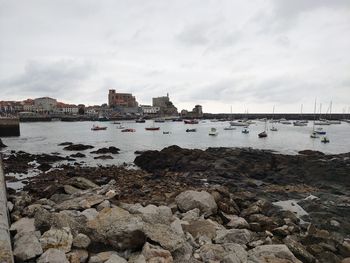 Scenic view of bay against sky