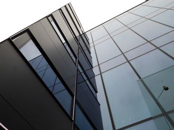 Low angle view of modern building against sky