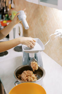 Midsection of woman preparing food