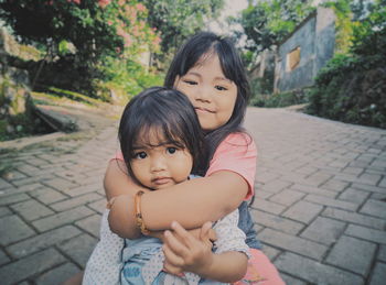 Portrait of mother and daughter