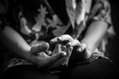 Close-up of couple holding hands