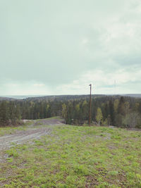 Scenic view of field against sky