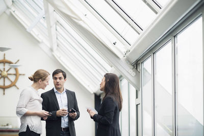 Business people communicating in office